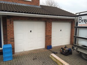 Ryterna Flush Slick Wood style sectional garage doors installed in Congleton Cheshire