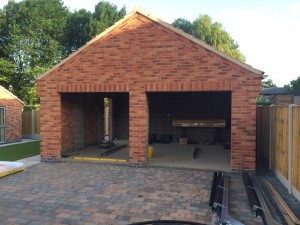 Byron Doors installs Ryterna R40 Flush Slick style steel sectional garage doors finished in RAL 7016 Anthracite Grey near Mansfield Nottinghamshire.