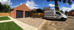 Byron Doors installs Ryterna R40 Flush Slick style steel sectional garage doors finished in RAL 7016 Anthracite Grey near Mansfield Nottinghamshire.